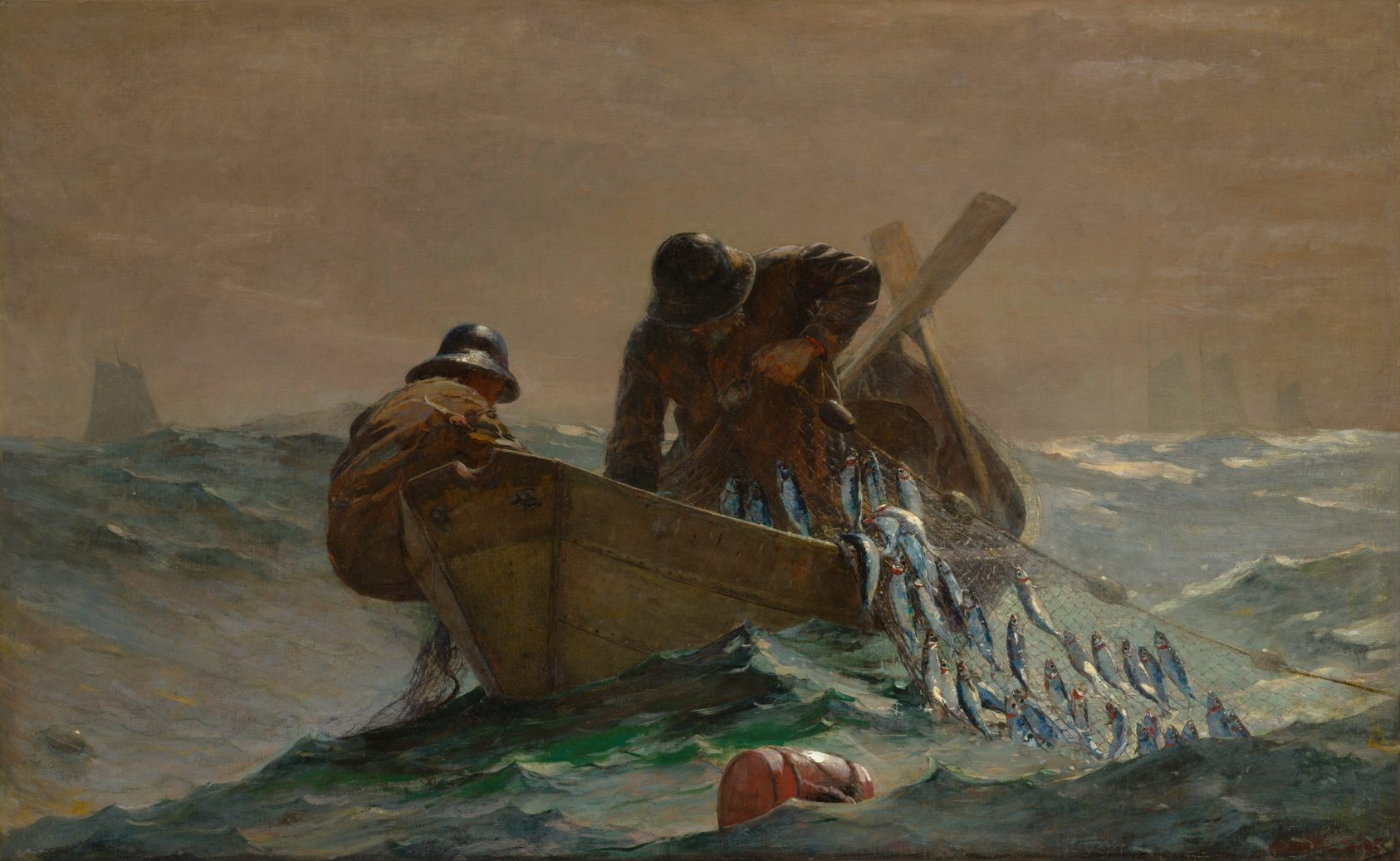 Two fishermen in a small boat hauling in a net of herring, in a grey sea.